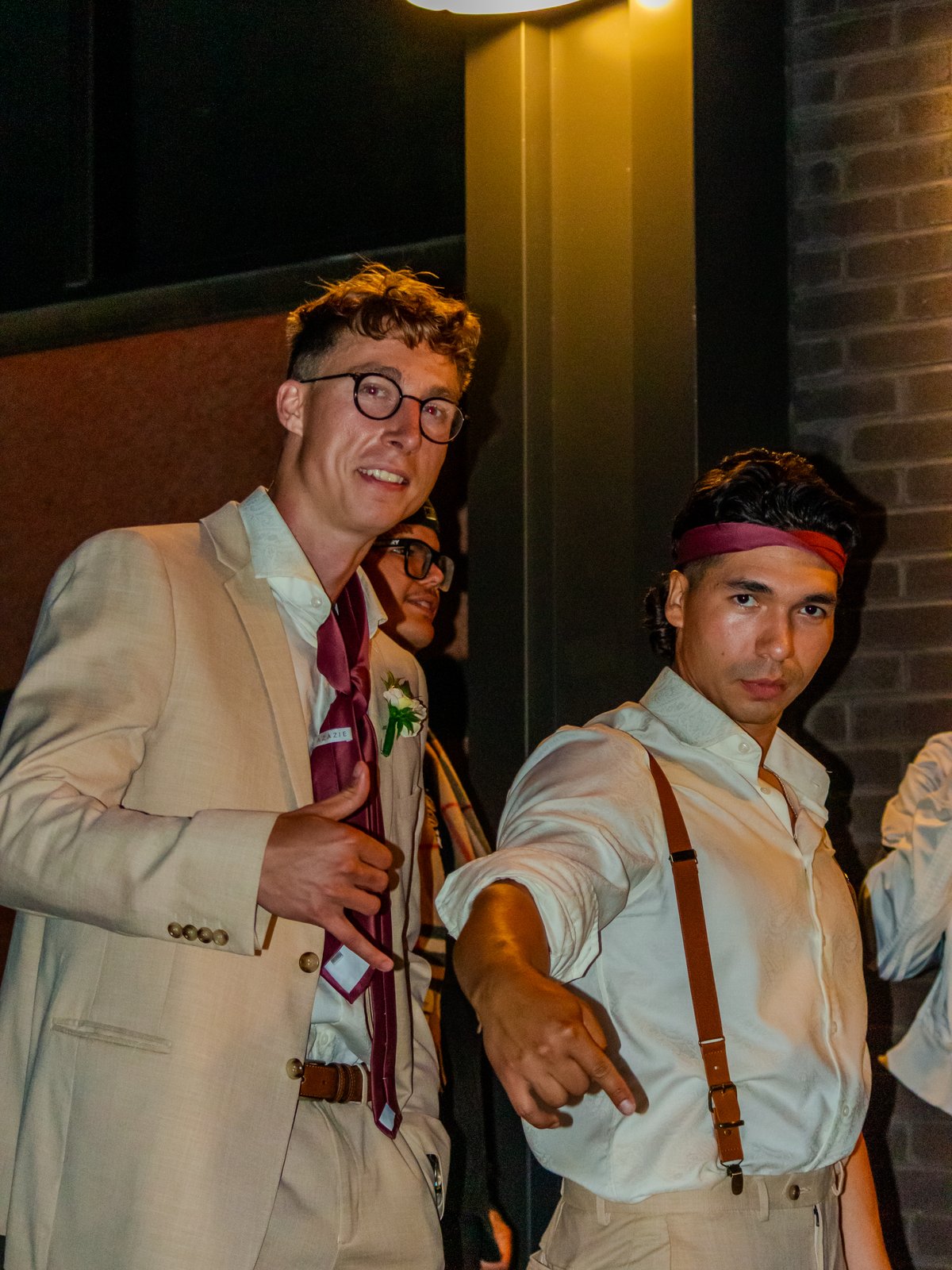 Two men in formal attire at evening event
